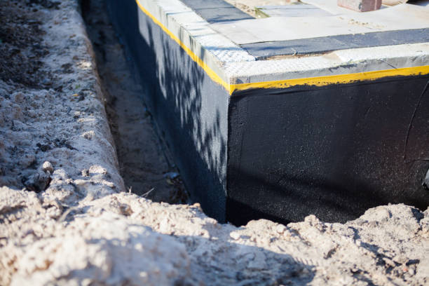 Professional Emergency Waterproofing technician working in Berrien Center, MI